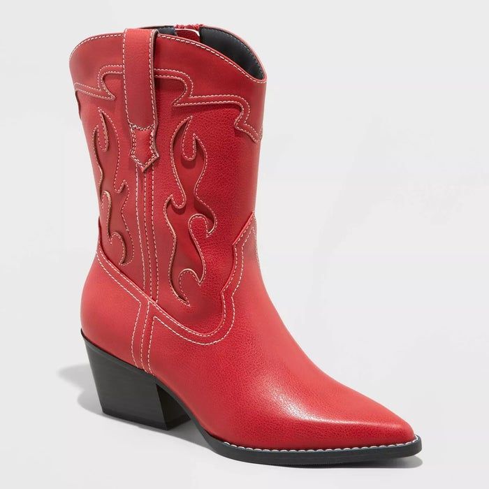 Red cowboy boots with classic stitching, angled shot highlighting intricate details