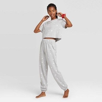 A front-facing shot of a model showcasing the set in a stylish gray hue.