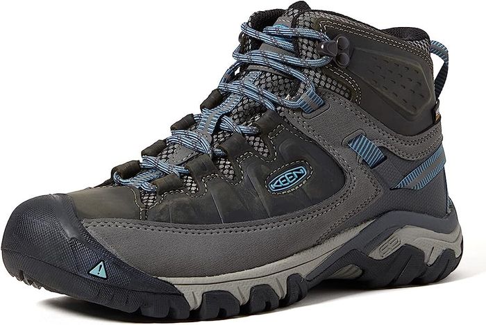 Hiking boots featuring a durable upper construction and a secure lace-up closure system