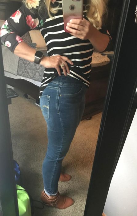 Reviewer wearing Signature by Levi Strauss Totally Shaping Pull-on Skinny Jeans in 