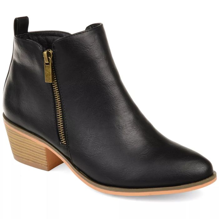 Black bootie with a gold zipper detail