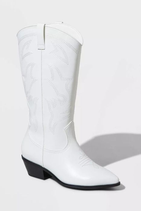 tall white cowgirl boots with black soles