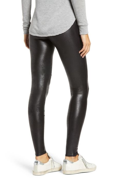 A model from behind wearing the leggings