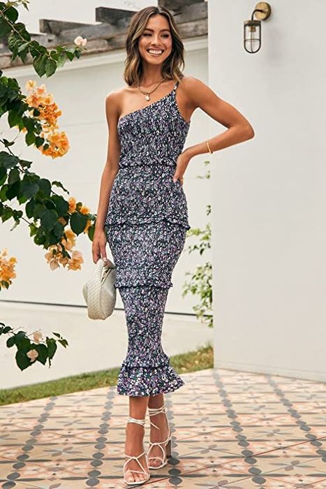 A full-length view of the navy blue floral dress
