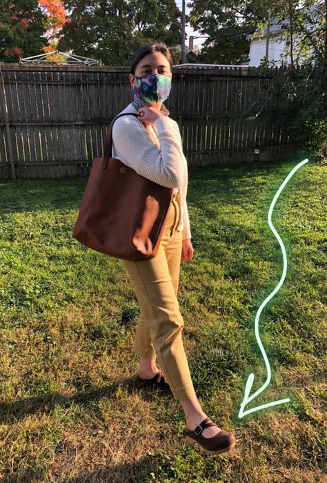 writer showing off the clogs in action