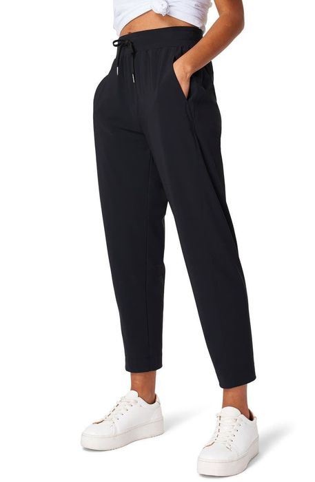 Model wearing black pants