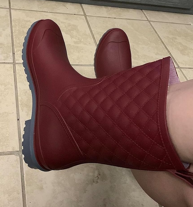 close-up of the red rain boots on a reviewer