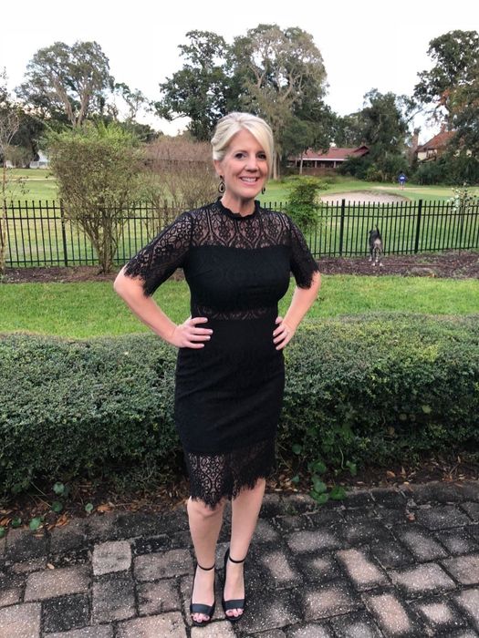 Another reviewer modeling the dress in black