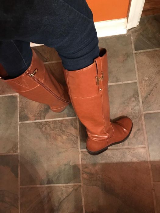 close-up of the cognac boots on a reviewer's feet