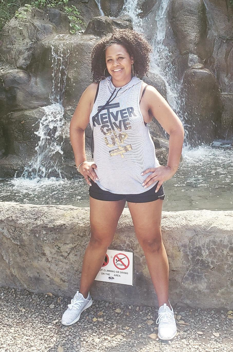 a reviewer wearing the white sneakers