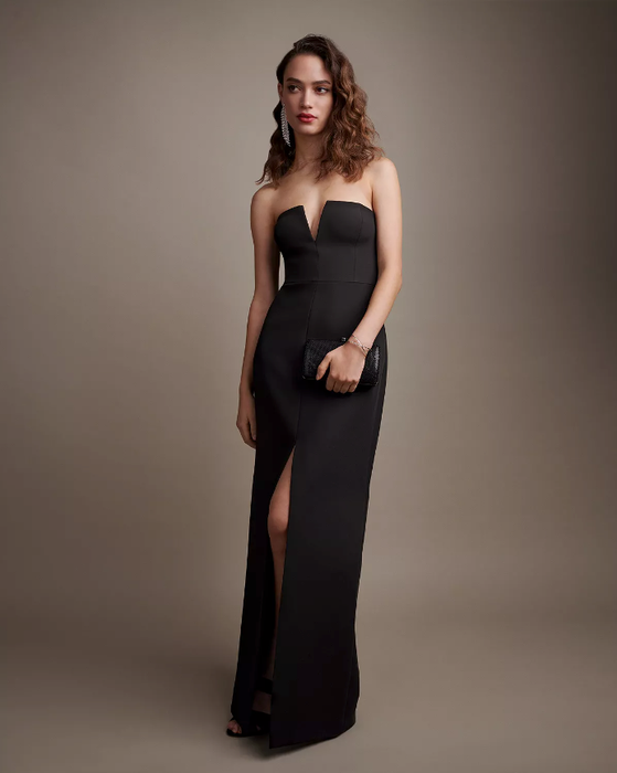 Photo of a model in a long black gown