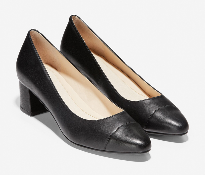 a pair of pointed-toe leather block heel pumps