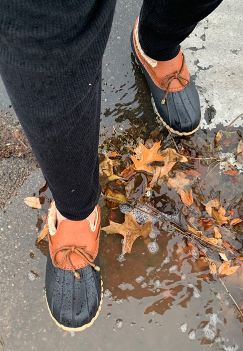 reviewer walking through a puddle in the shoes