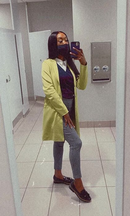 reviewer wearing the loafers paired with a professional outfit
