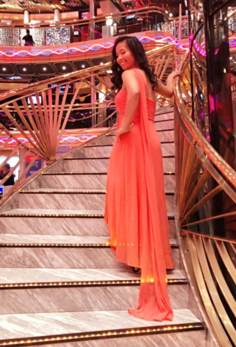 Another reviewer showcasing the long train of the gown