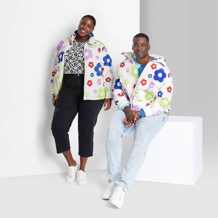 two models wearing the jacket in white floral