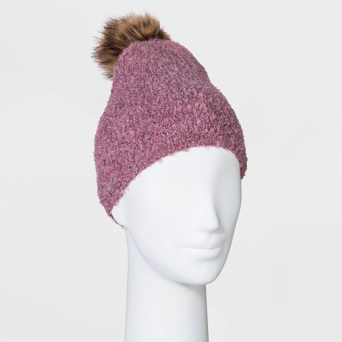 pink boucle beanie with faux fur pom