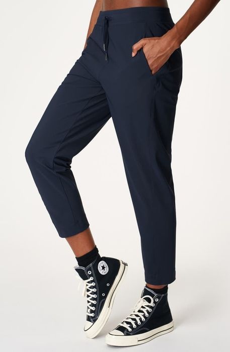 model wearing navy jogger pants