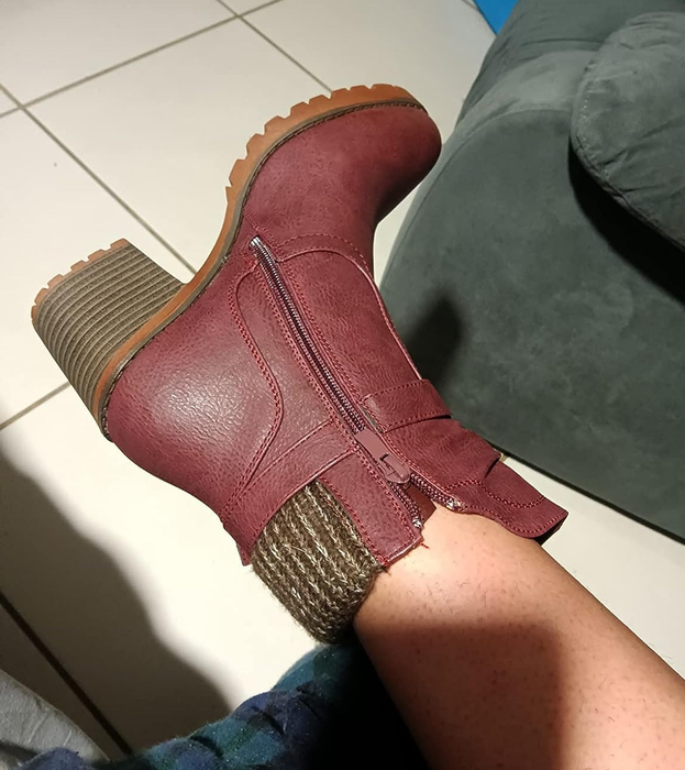 detailed shot of the burgundy chunky-heeled boot worn by a reviewer