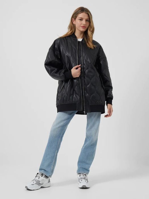 Photo of a model wearing a black jacket