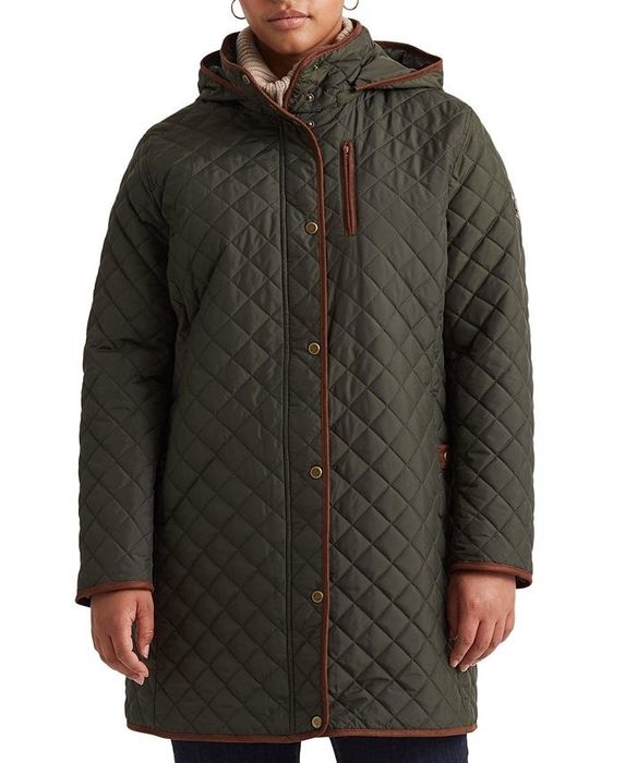 A model styled in a green and brown coat