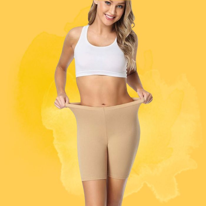 Model wearing the white shorts