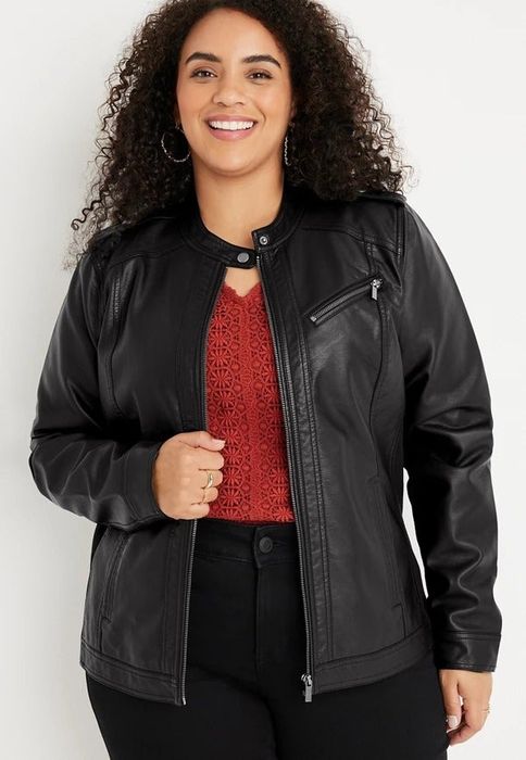 Photo of a model wearing a black jacket