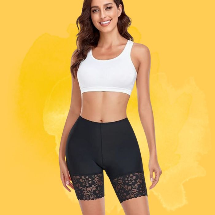 Model showcasing the black lace shorts