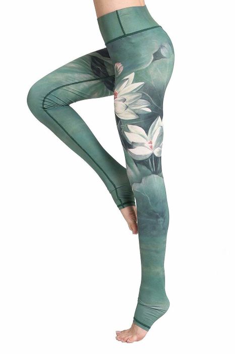 The leggings featuring a white floral and green design