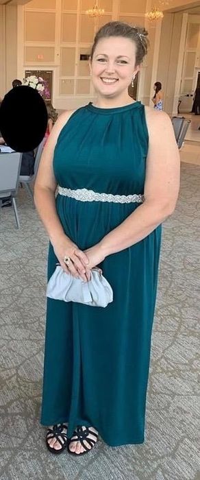 The dress in a beautiful aquamarine shade.