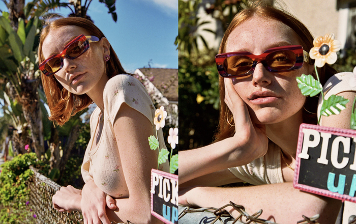 A model wearing vibrant, colorful sunglasses.