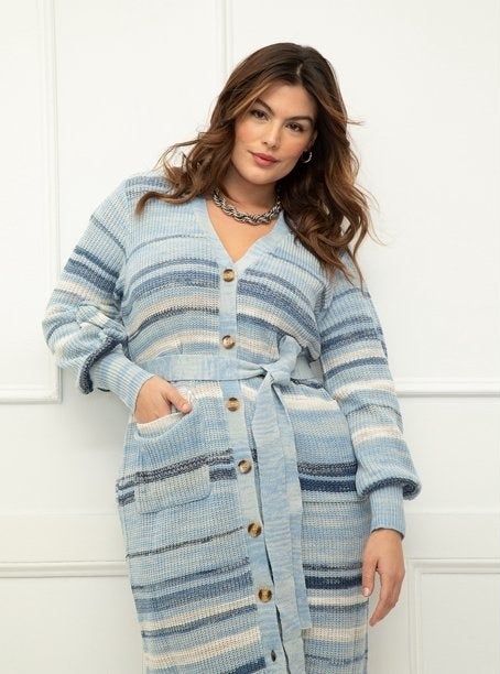 Model wearing a blue-and-white striped dress