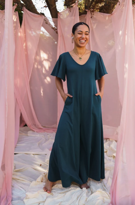model showcasing the navy jumpsuit