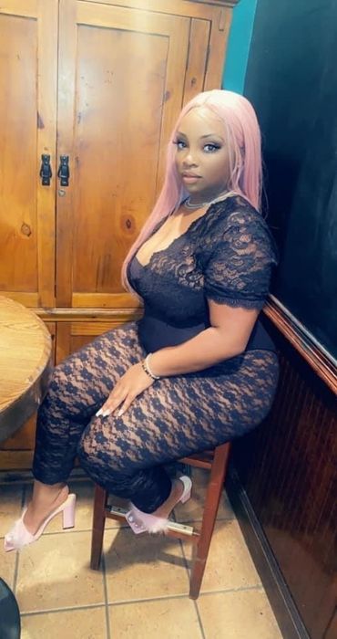 A reviewer's photo showcasing a lace lingerie outfit