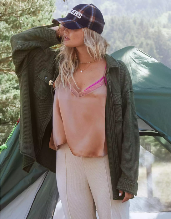 a model showcasing the olive green shirt