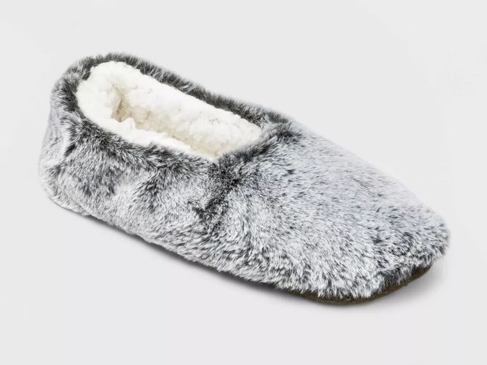 An olive green faux fur pull-on slipper