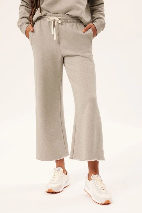model showcasing the grey sweatpants