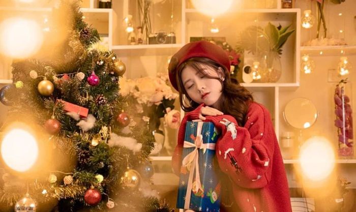 Cách tạo dáng chụp ảnh Noel cùng hộp quà
