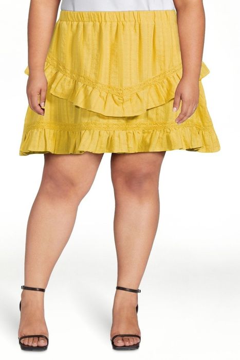 A model showcasing the yellow skirt