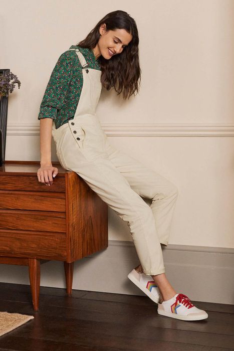 A model styling overalls in 