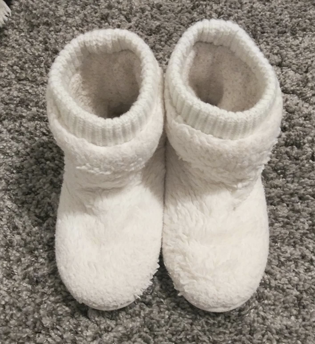 reviewer photo of the white slippers