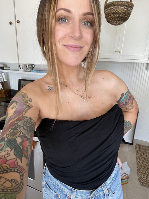 Reviewer styling the top in black