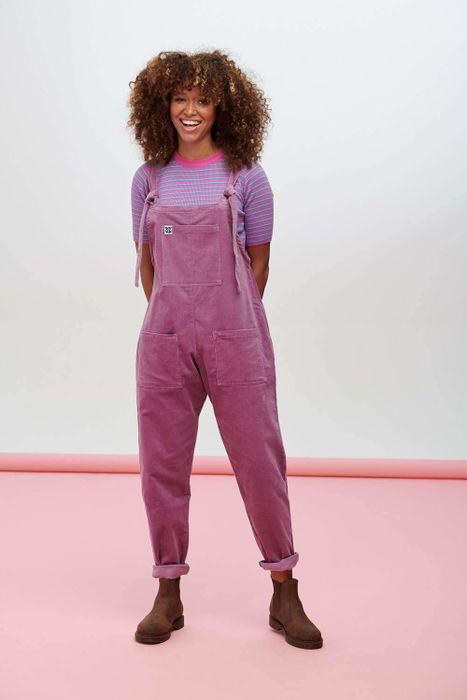 a model wearing the grape Organic Original Corduroy Dungarees