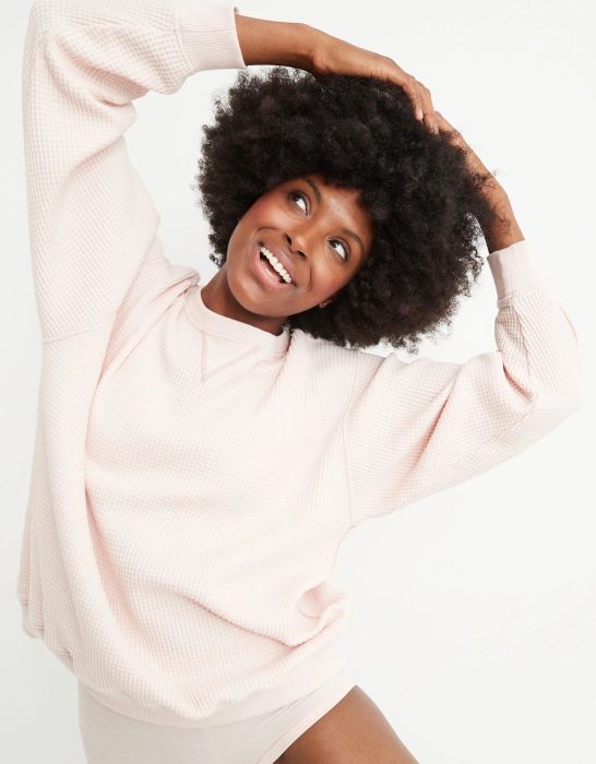 model in the light pink waffle crewneck sweatshirt