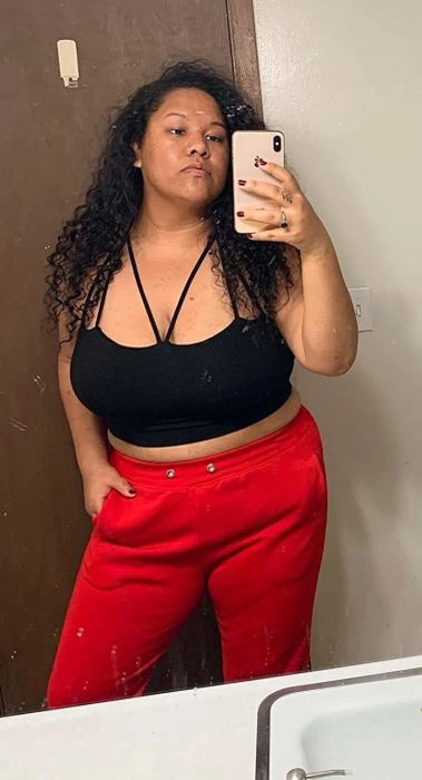 Reviewer showing the same top in a mirror selfie