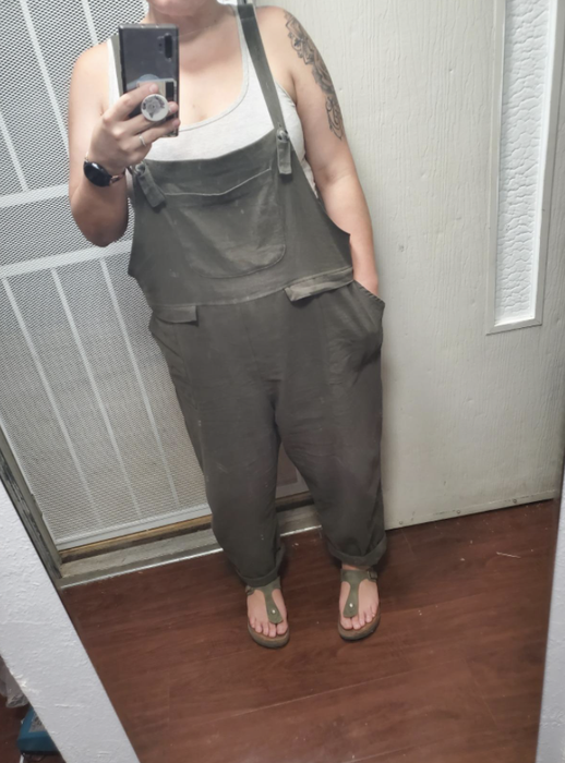 reviewer sporting comfortable overalls