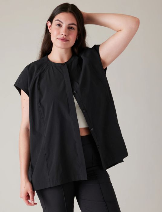 Oversized top modeled by a model