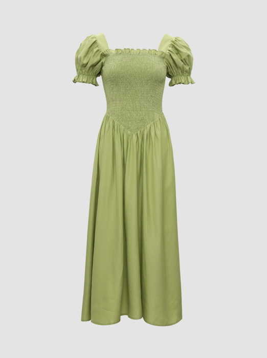 A green maxi dress with short puffed sleeves