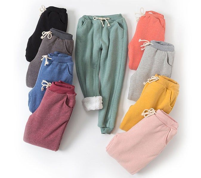 nine Flygo fleece joggers displayed in a variety of vibrant colors