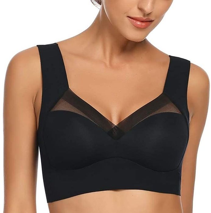 a model wearing the black Plunge Bralette